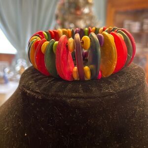 8” Novica stretch bracelet with 72 red green yellow blue pink purple beads